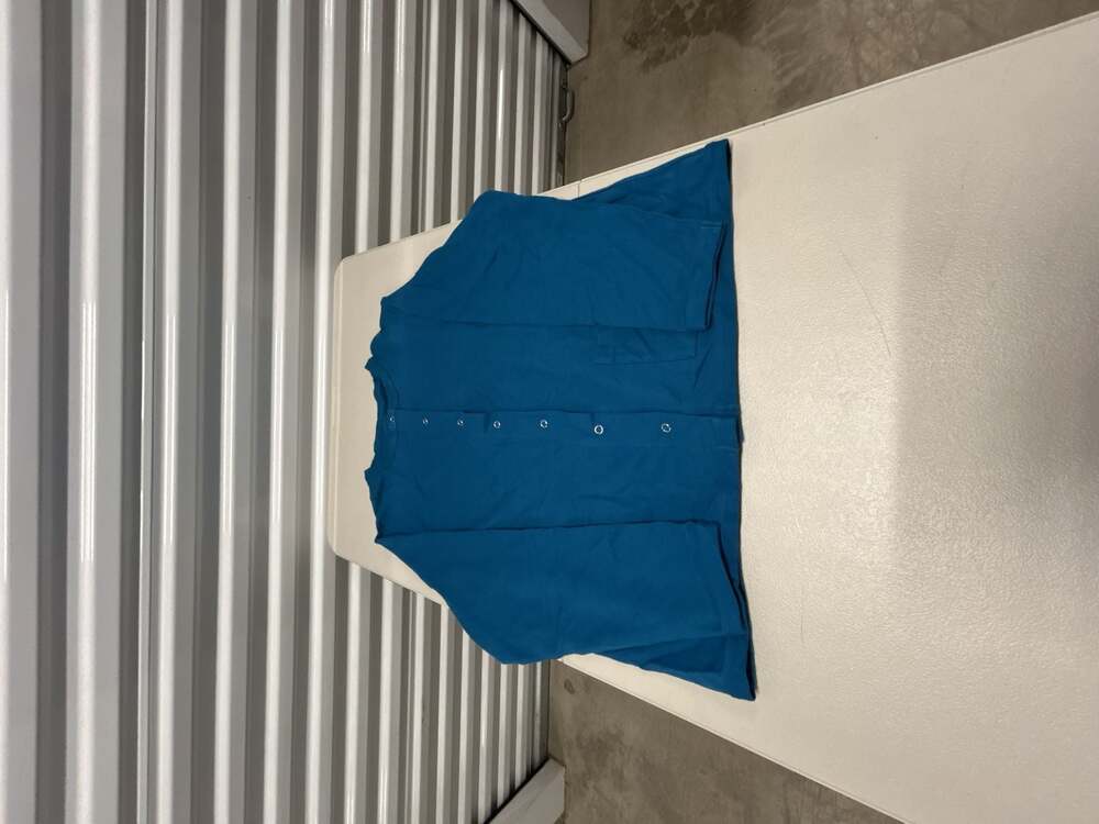 Medline AngelStat Women's Long Sleeve Snap Front Teal Scrub Jacket